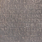 1715 | Gedenkstein zur Errichtung der Kirchhofsmauer